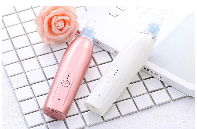 Darziq Acne Blackhead Suction Remover device with multiple heads for facial pore cleansing and blackhead removal.