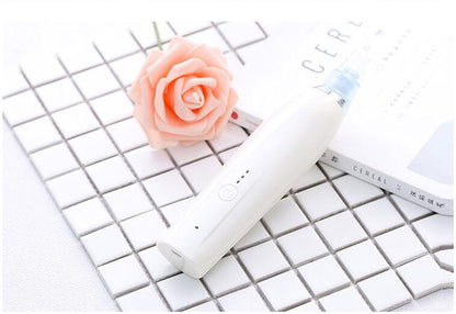 Darziq Acne Blackhead Suction Remover in black, showing its handheld device with a rounded metal tip for pore extraction.
