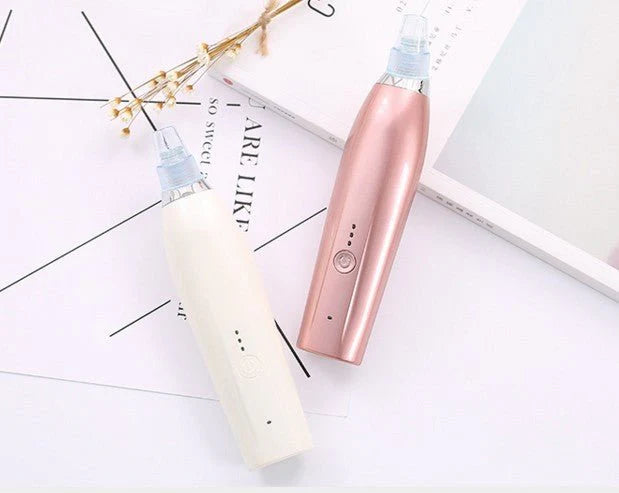 Darziq acne blackhead suction remover device for deep cleansing, with a clear view of the blackhead extraction tip.