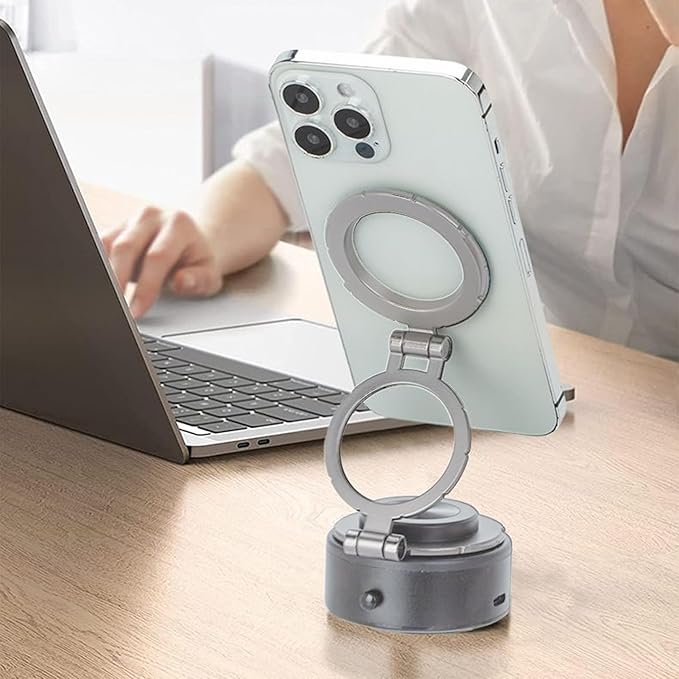 Darziq dashboard phone holder for car, compact gadget with adjustable grip, secure mount for smartphones during driving.