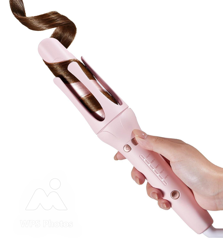 Darziq automatic curling iron for healthy, beautiful curls with sleek design and easy operation in a health and beauty setting.