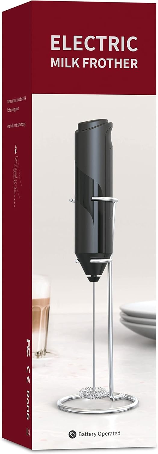 Darziq electric milk frother for home and kitchen, showing stainless steel tip and frothing jug with milk.