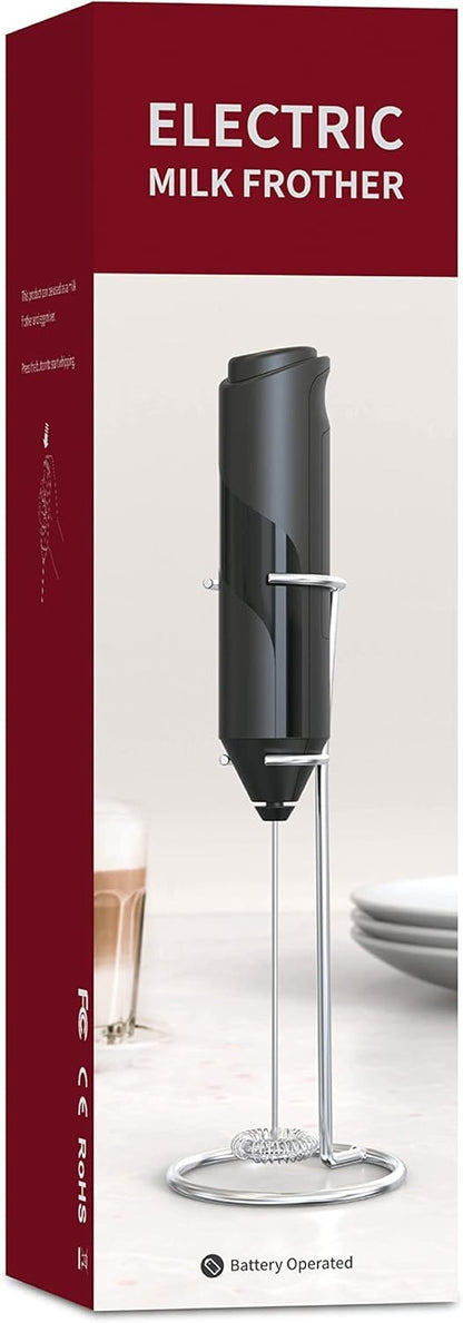 Darziq electric milk frother for home and kitchen, showing stainless steel tip and frothing jug with milk.