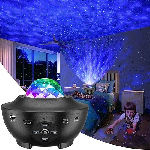 Darziq Galaxy Projector with Bluetooth music speaker displaying starry night sky projection and built-in speaker in a home setting