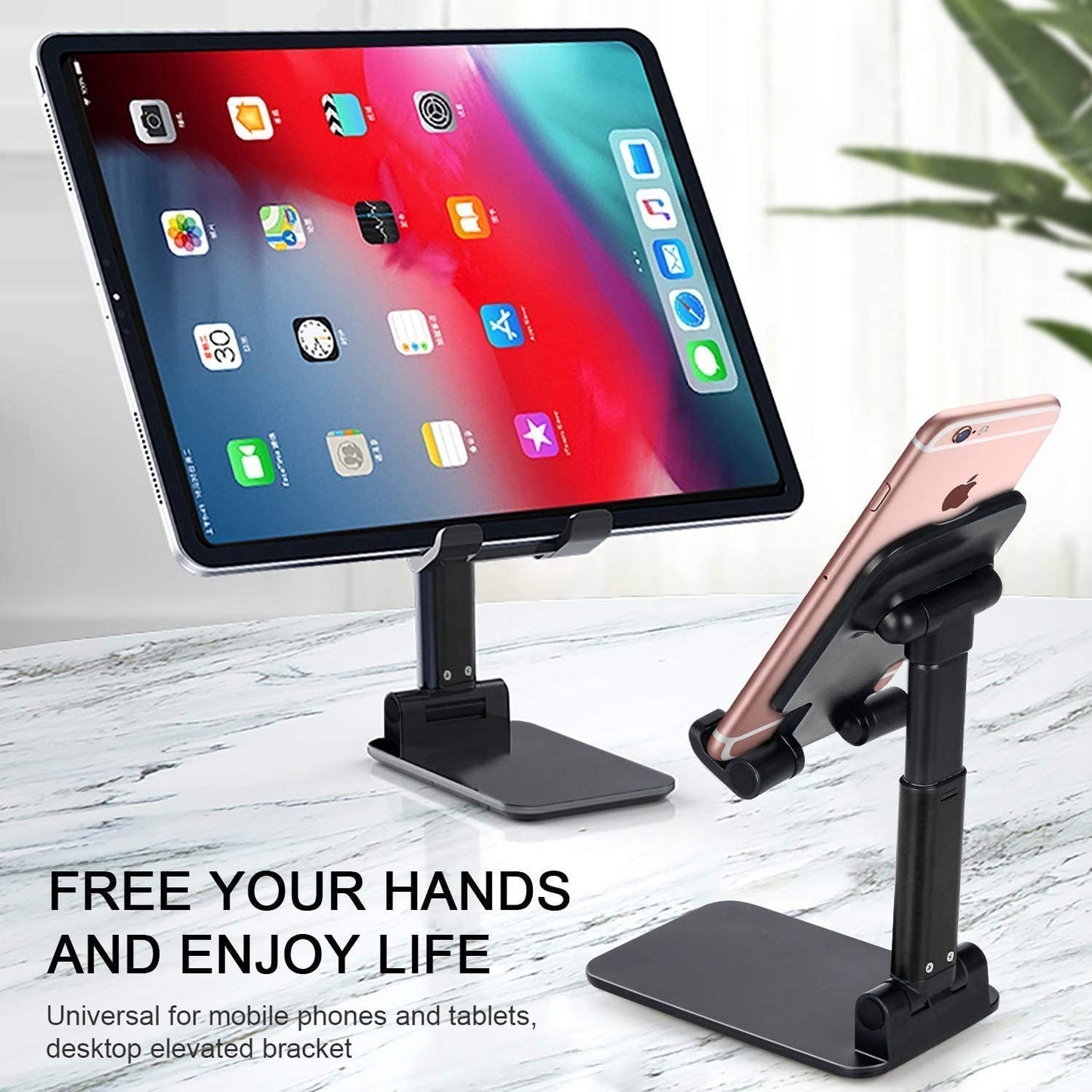 Darziq desktop and mobile phone stand holding a smartphone and laptop in a workspace setting.