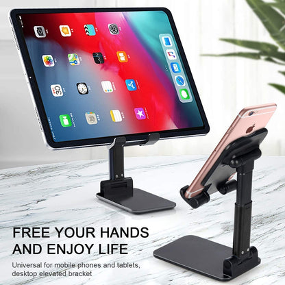 Darziq desktop and mobile phone stand holding a smartphone and laptop in a workspace setting.