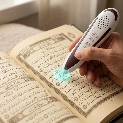 Dar Al Ghalah Quran reading pen by Darziq, a sleek black tech device with a button and speaker for audio Quran recitation.