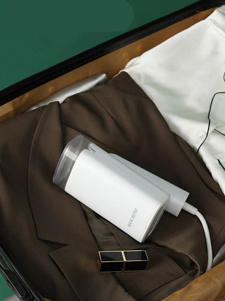 Darziq portable handheld garment steamer for home use, featuring a compact design for easy hanging clothing steaming.