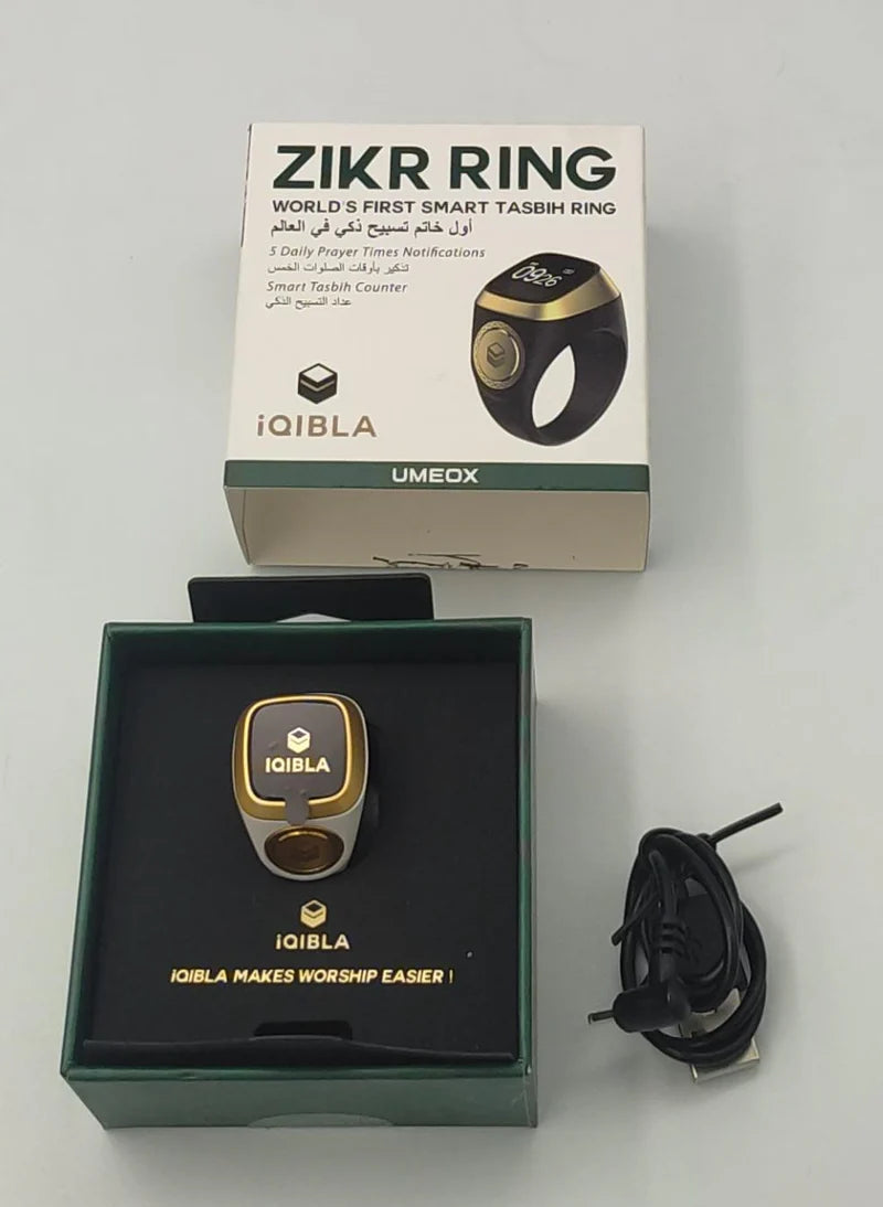Darziq Zikr Ring gadget with intricate design, made of metal, featuring a smooth, rounded surface and detailed craftsmanship.